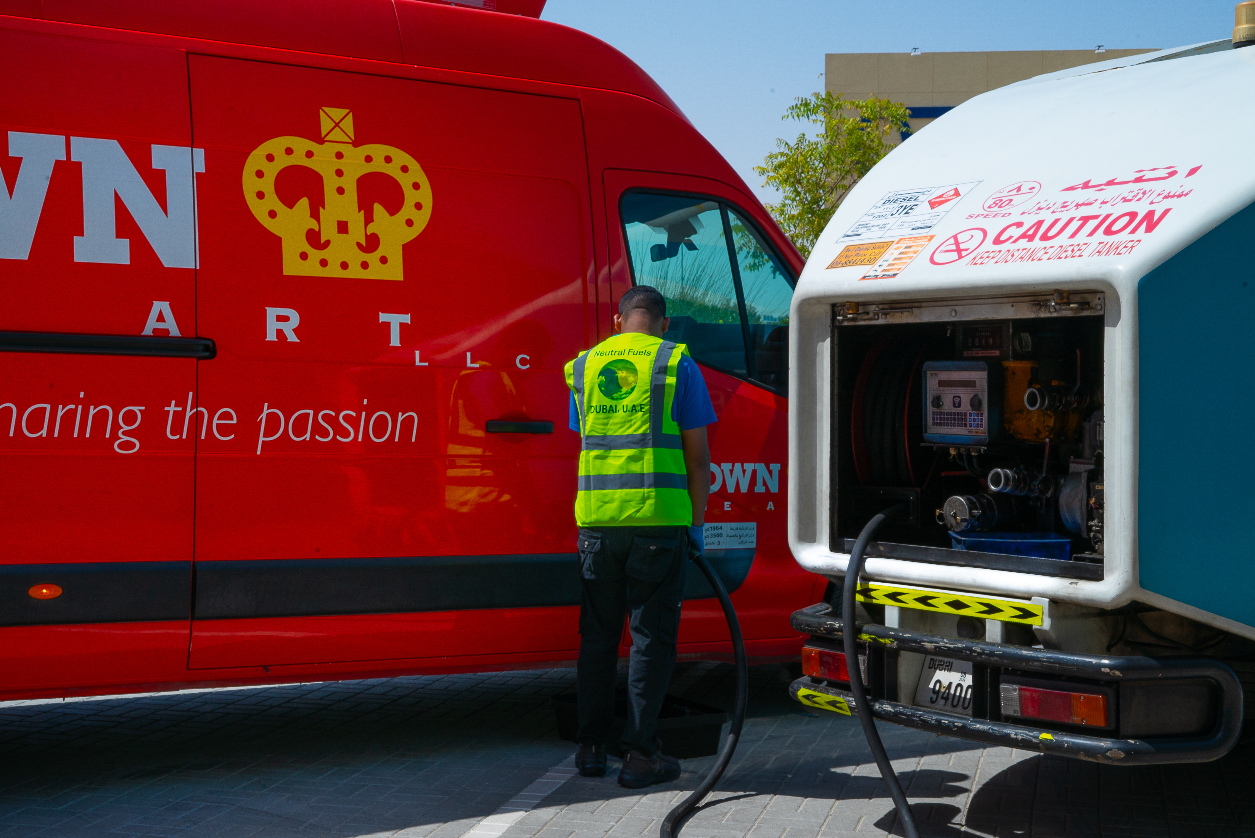 Neutral Fuels employee fuelling a Crown Relocations Truck in Dubai, UAE 
